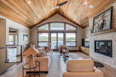 Experience sophisticated lakefront living in this striking - photo 4