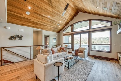 Experience sophisticated lakefront living in this striking - photo 5