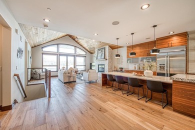 Experience sophisticated lakefront living in this striking - photo 9