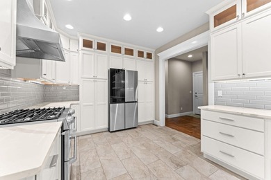 Immaculate, upgraded, and beautifully maintained, this 6-bedroom - photo 12