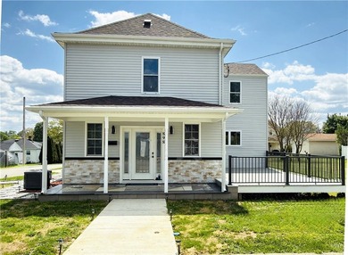 A fully reimagined four-bed, three-and-a-half-bath home blending - photo 1