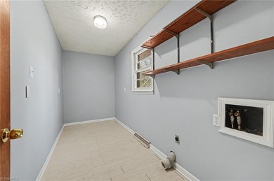 Classic 3 BR, 2 BA brick ranch offers charm, *character*, and