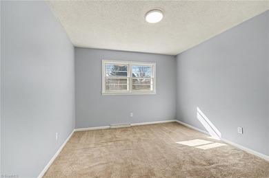 Classic 3 BR, 2 BA brick ranch offers charm, *character*, and