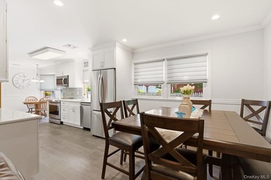 Welcome to this beautifully updated L-Shaped Ranch nestled in - photo 13