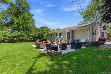 Welcome to this beautifully updated L-Shaped Ranch nestled in - photo 27