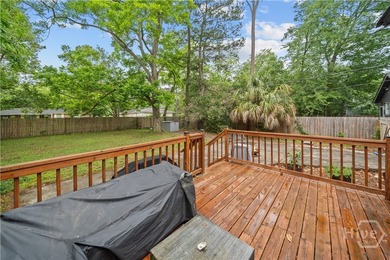 Step into timeless charm with modern luxury in this beautifully - photo 38