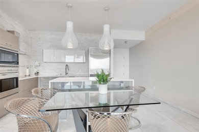 SPECTACULAR UNIT WITH DIRECT BAY VIEWS OF BISCAYNE BAY. 2 BED, 2