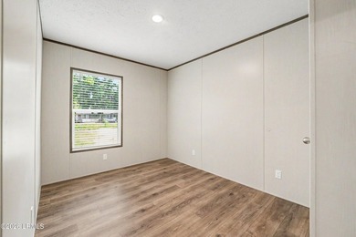 BRAND NEW mobile home with .5 acres! This spacious 4-bedroom - photo 16