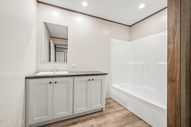 BRAND NEW mobile home with .5 acres! This spacious 4-bedroom - photo 18