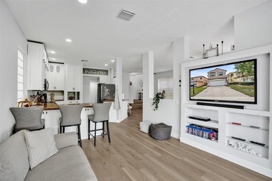 This beautifully updated 4BR/2.5BA waterfront home offers serene - photo 8