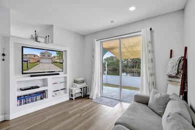 This beautifully updated 4BR/2.5BA waterfront home offers serene - photo 9