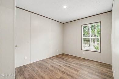 BRAND NEW mobile home with .5 acres! This spacious 4-bedroom - photo 22