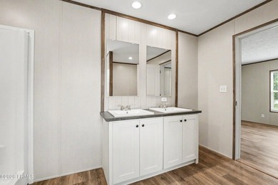 BRAND NEW mobile home with .5 acres! This spacious 4-bedroom - photo 33