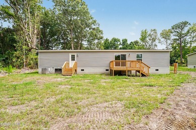 BRAND NEW mobile home with .5 acres! This spacious 4-bedroom - photo 37