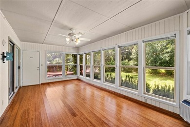 Nestled on a beautiful, level 1/2+ acre lot, this inviting - photo 2