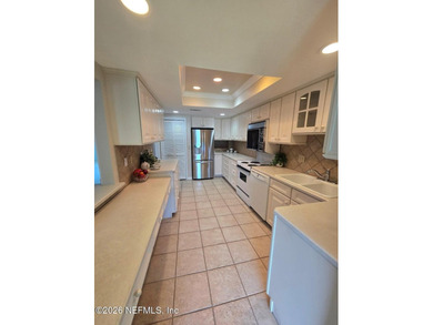This 2-bedroom, 2-bath single-level condo is located within the - photo 2