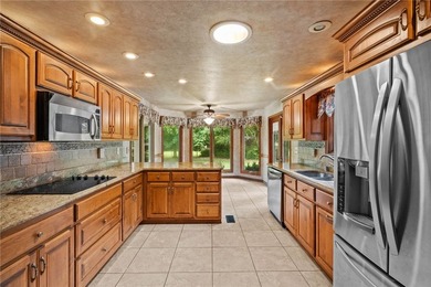 Nestled on a beautiful, level 1/2+ acre lot, this inviting - photo 3