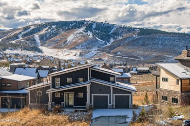 This modern four-bedroom single-family home in Granby Ranch - photo 1