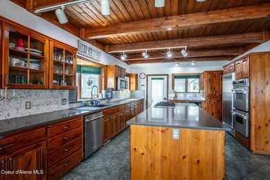 Timeless waterfront retreat with soaring cathedral ceilings, an - photo 13