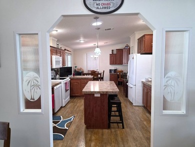 THIS HOME IS ON LEASED LAND WITH A MONTHLY LOT OF $545 AND THAT - photo 20