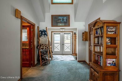 Timeless waterfront retreat with soaring cathedral ceilings, an - photo 21