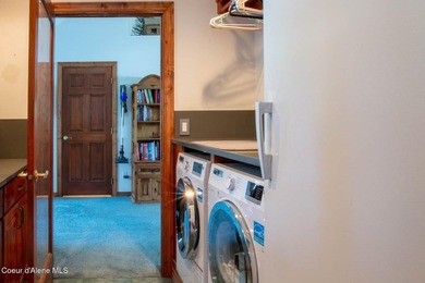 Timeless waterfront retreat with soaring cathedral ceilings, an - photo 26
