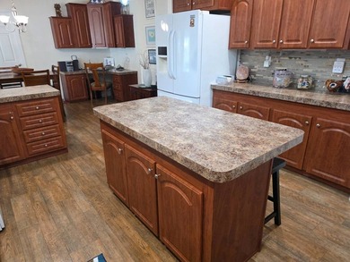 THIS HOME IS ON LEASED LAND WITH A MONTHLY LOT OF $545 AND THAT - photo 26