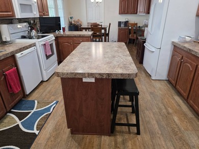 THIS HOME IS ON LEASED LAND WITH A MONTHLY LOT OF $545 AND THAT - photo 27