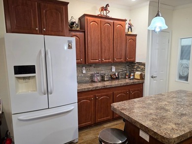 THIS HOME IS ON LEASED LAND WITH A MONTHLY LOT OF $545 AND THAT - photo 29