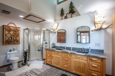 Timeless waterfront retreat with soaring cathedral ceilings, an - photo 34