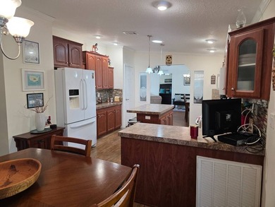 THIS HOME IS ON LEASED LAND WITH A MONTHLY LOT OF $545 AND THAT - photo 35