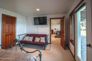 Timeless waterfront retreat with soaring cathedral ceilings, an - photo 48