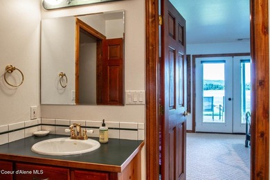 Timeless waterfront retreat with soaring cathedral ceilings, an - photo 49