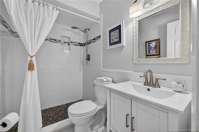 This lovely home has been exquisitely remodeled with a designers - photo 17