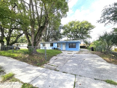 Discover the potential of this single-story concrete block home - photo 3