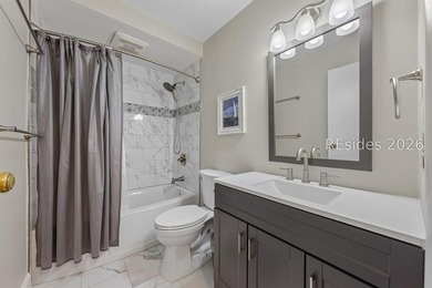 Completely renovated, this 2-bedroom, 2-bath Treetops villa - photo 25