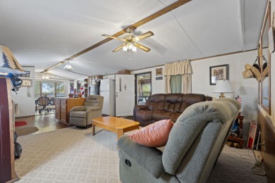 Welcome to this beautifully maintained 3-bedroom, 2-bathroom