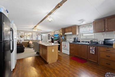 Welcome to this beautifully maintained 3-bedroom, 2-bathroom