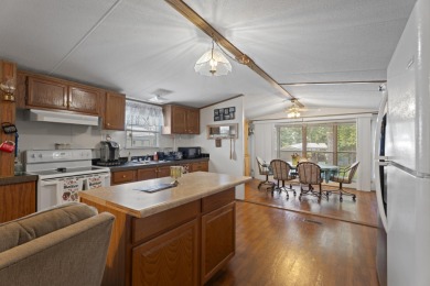 Welcome to this beautifully maintained 3-bedroom, 2-bathroom