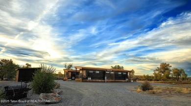 The Wind River Ranch is a family ranch that has been in - photo 5