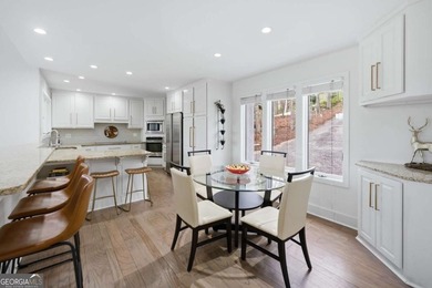 Tucked away on a quiet cove in the highly sought after Lake - photo 16