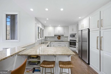 Tucked away on a quiet cove in the highly sought after Lake - photo 17