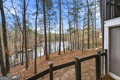 Tucked away on a quiet cove in the highly sought after Lake - photo 50