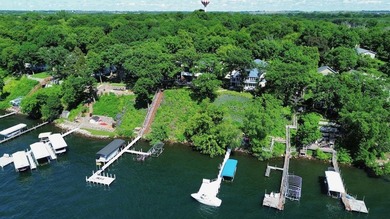 Sitting upon perhaps the highest perch of West Lake Okoboji, the - photo 2
