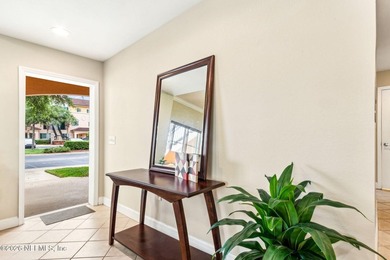 Experience refined condominium living in the prestigious gated - photo 3