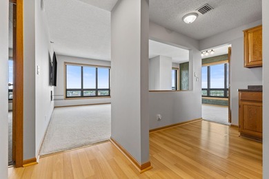 Set high on the 29th floor of Airye Tower, this corner-unit - photo 11