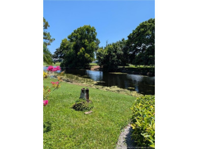 Lake Home For Sale in Hobe Sound, Florida