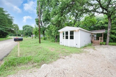 Lake Home For Sale in Enchanted Oaks, Texas