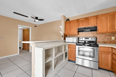 Welcome to this charming 2-bedroom, 1.5-bath townhouse featuring - photo 9