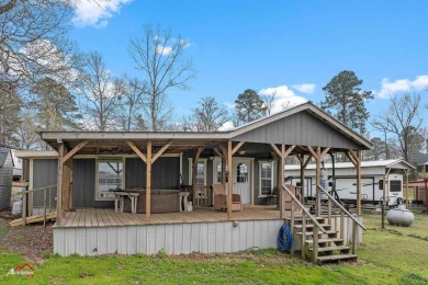 The property has endless possibilities.  Escape to tranquility - Lake Home For Sale in Carthage, Texas